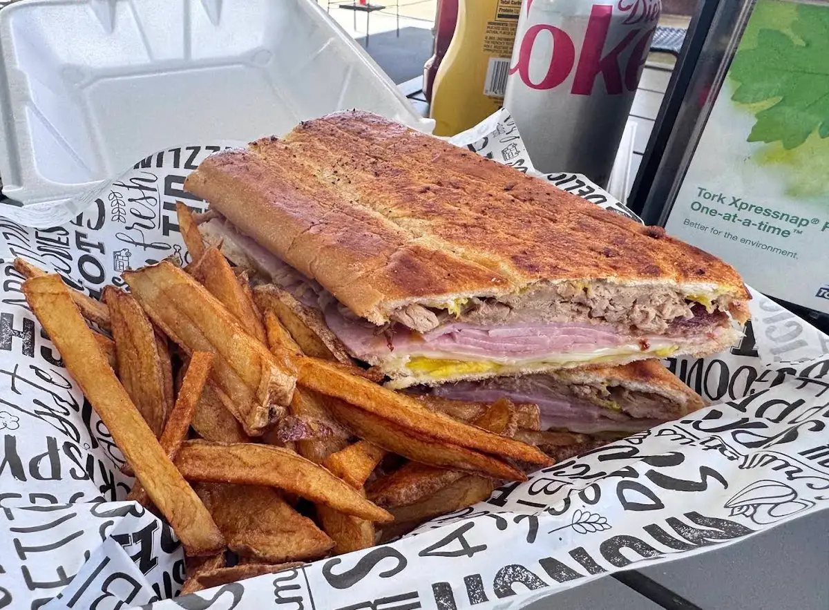 The Cuban sandwich, pressed with natural-cut fries