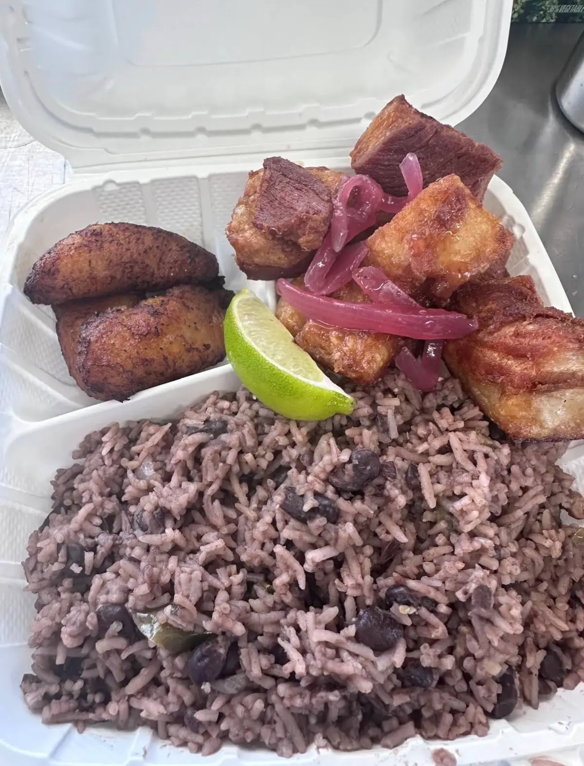 Masitas de puerco with congrí and sweet plantains